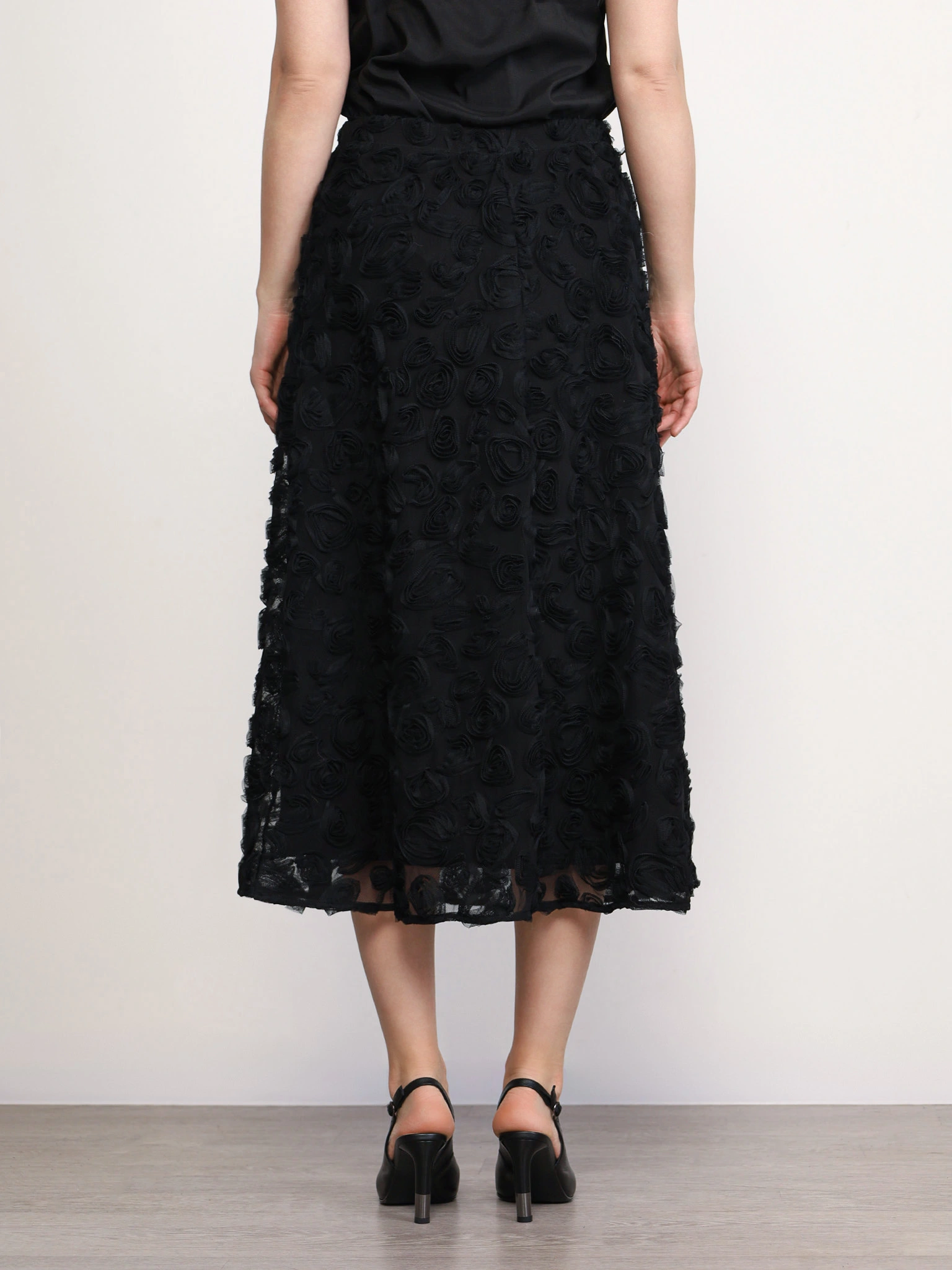 Юбка черного цвета из фактурного трикотажа